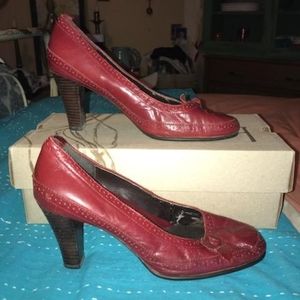 Cranberry red leather pumps